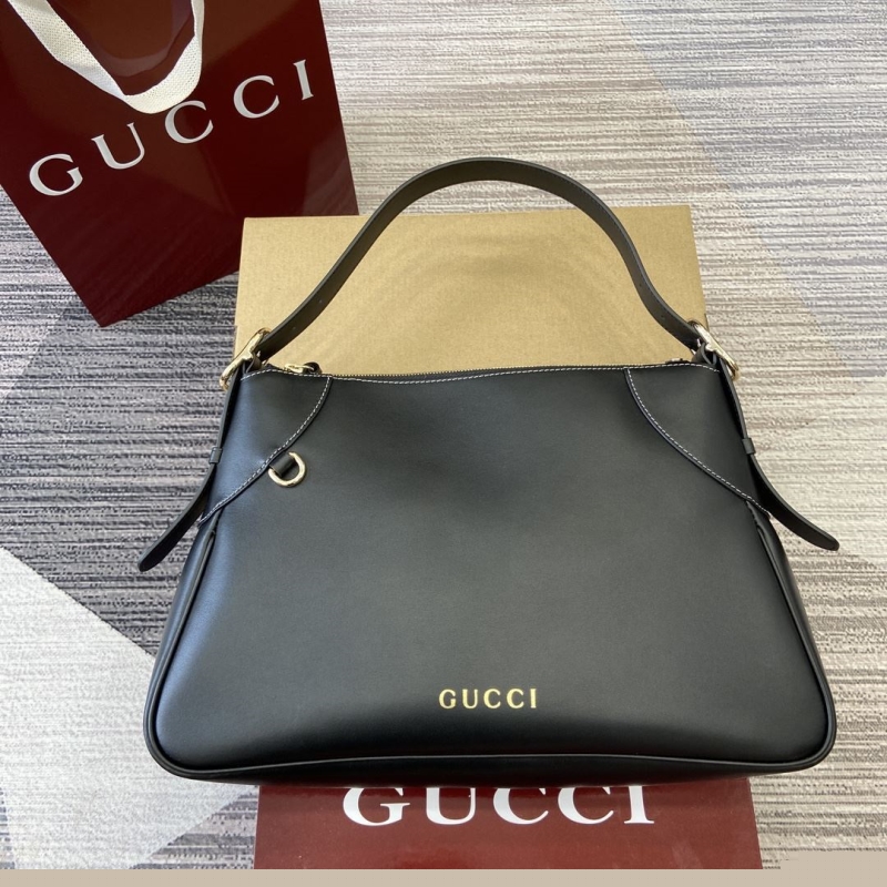 G*u*i top handle bags